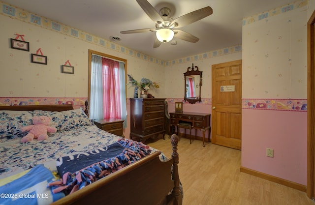 540 Mohawk Dr, Mohawk, NY 12068 - bedroom featuring light wood-type flooring, wallpapered walls, and a ceiling fan