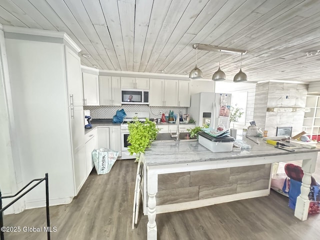 351 Gansevoort Rd, Moreau, NY 12828 - kitchen featuring white appliances, wooden ceiling, white cabinets, dark wood-style flooring, and hanging light fixtures