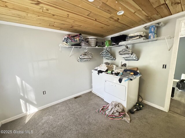 351 Gansevoort Rd, Moreau, NY 12828 - washroom featuring wooden ceiling, carpet floors, crown molding, baseboards, and washer and clothes dryer
