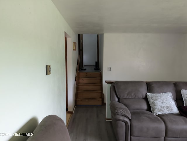 2714 Magnolia St, Endicott, NY 13760 - living room with wood finished floors, stairs, and baseboards