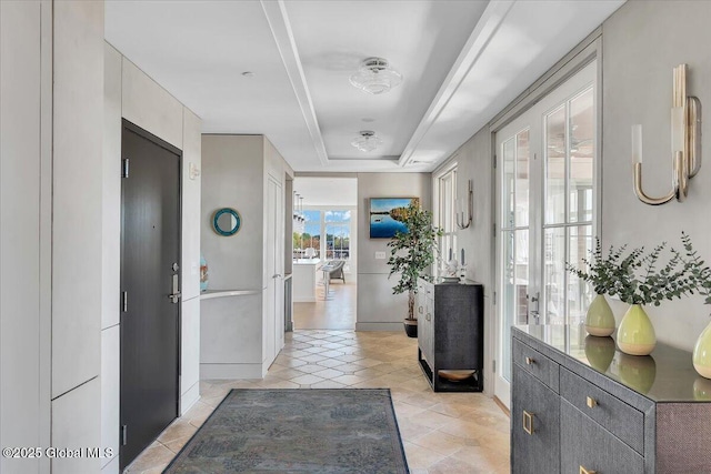 268 Broadway Unit 607, Saratoga Springs, Inside, NY 12866 - hall with a raised ceiling and light tile patterned flooring