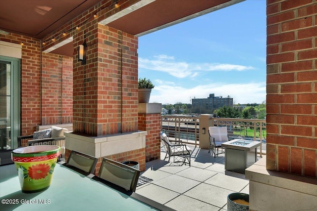 268 Broadway Unit 607, Saratoga Springs, Inside, NY 12866 - balcony featuring an outdoor fire pit