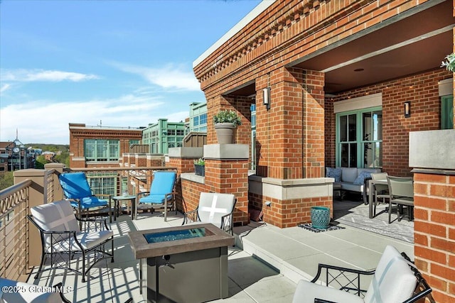 268 Broadway Unit 607, Saratoga Springs, Inside, NY 12866 - view of patio with an outdoor living space with a fire pit