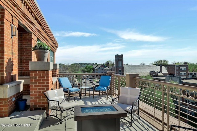 268 Broadway Unit 607, Saratoga Springs, Inside, NY 12866 - view of patio featuring a fire pit