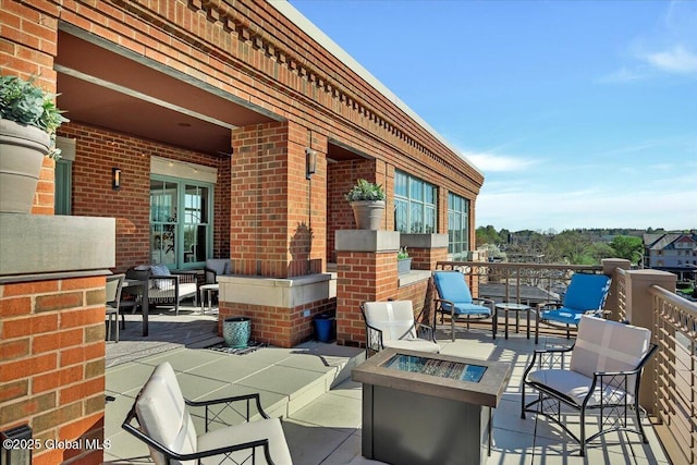 268 Broadway Unit 607, Saratoga Springs, Inside, NY 12866 - view of patio featuring a fire pit