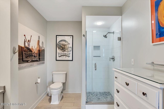 268 Broadway Unit 607, Saratoga Springs, Inside, NY 12866 - full bath with vanity, toilet, a shower stall, and baseboards