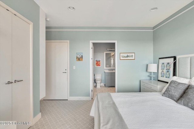 268 Broadway Unit 607, Saratoga Springs, Inside, NY 12866 - bedroom with baseboards, ensuite bath, recessed lighting, and light colored carpet