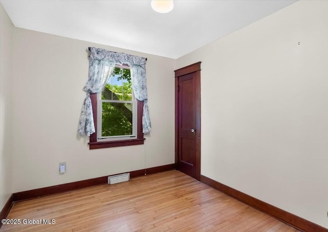 92 Fiddlers Ln, Colonie, NY 12110 - empty room with baseboards and light wood finished floors