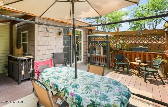 92 Fiddlers Ln, Colonie, NY 12110 - wooden deck with outdoor dining space and grilling area