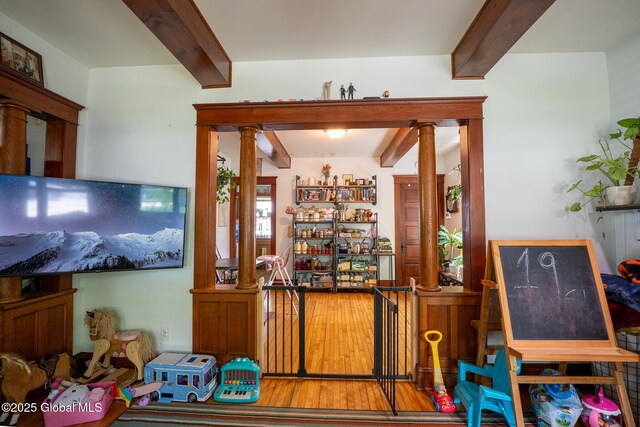 3 Grove St, Bethlehem, NY 12054 - bar with beamed ceiling, decorative columns, and wood finished floors