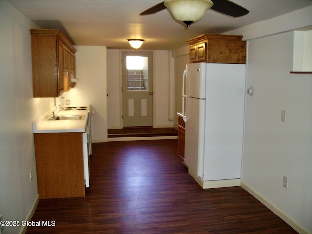 3 Grove St, Bethlehem, NY 12054 - kitchen with freestanding refrigerator, a ceiling fan, dark wood finished floors, and brown cabinetry