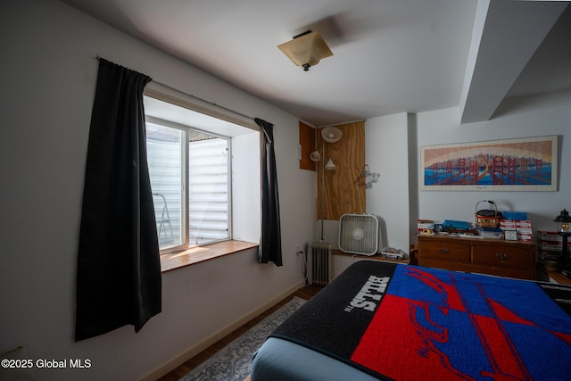 3 Grove St, Bethlehem, NY 12054 - bedroom featuring radiator heating unit, wood finished floors, and baseboards