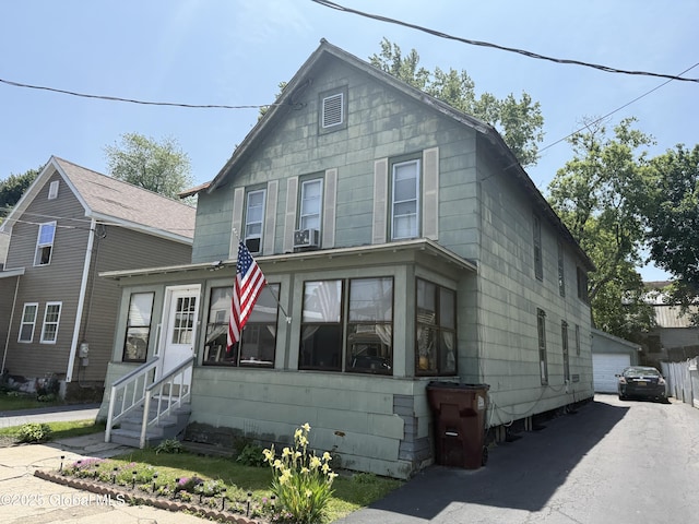 32 5th Ave, Gloversville, NY 12078 - view of front of property with entry steps, an outbuilding, and a garage