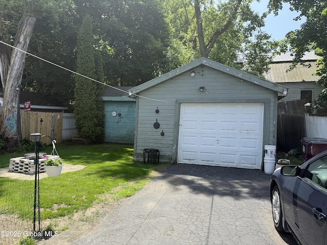 32 5th Ave, Gloversville, NY 12078 - garage with asphalt driveway