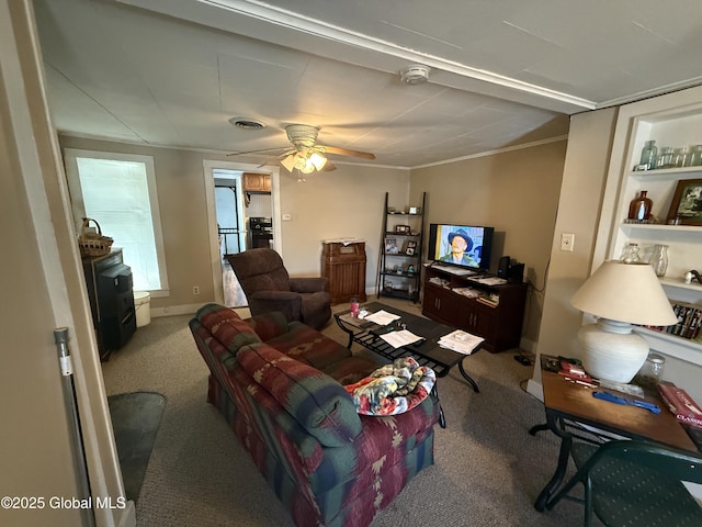 32 5th Ave, Gloversville, NY 12078 - carpeted living room with crown molding and ceiling fan