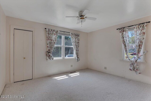 327 Sullivan Rd, Schenectady, NY 12304 - unfurnished bedroom with carpet and a ceiling fan