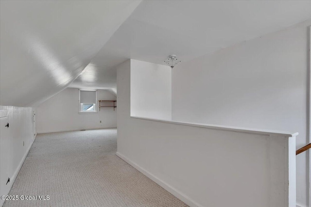 327 Sullivan Rd, Schenectady, NY 12304 - bonus room with vaulted ceiling, carpet floors, and baseboards