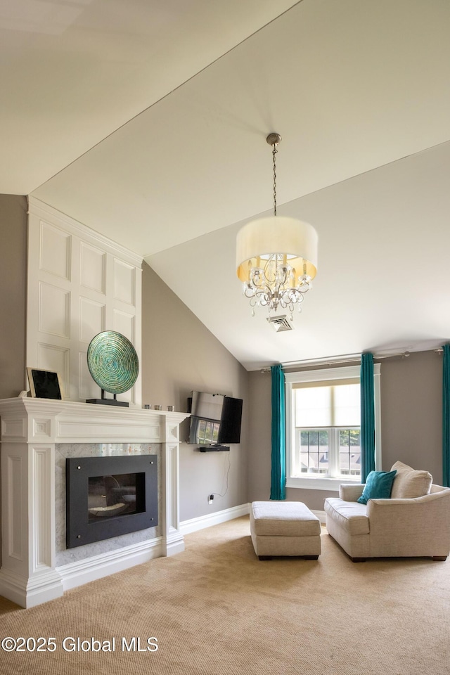 1269 Hawthorn Rd, Niskayuna, NY 12309 - living area with carpet flooring, a chandelier, lofted ceiling, and a premium fireplace