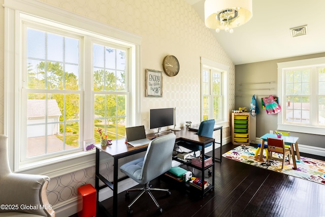 1269 Hawthorn Rd, Niskayuna, NY 12309 - home office featuring wallpapered walls, vaulted ceiling, plenty of natural light, wood-type flooring, and a chandelier