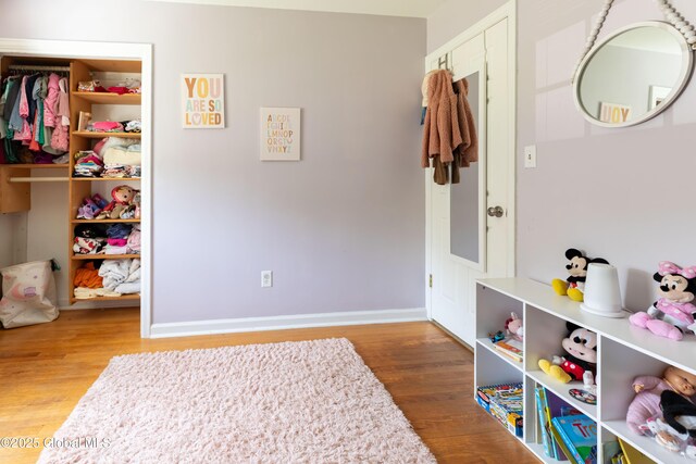 1269 Hawthorn Rd, Niskayuna, NY 12309 - game room with wood finished floors and baseboards