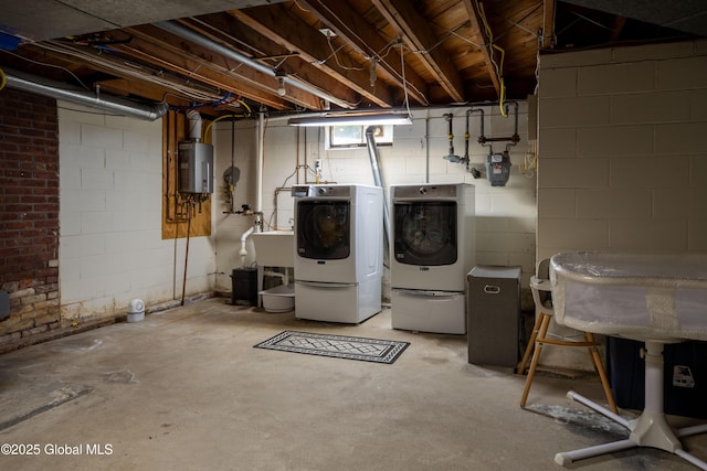 1269 Hawthorn Rd, Niskayuna, NY 12309 - basement featuring washer and dryer and tankless water heater