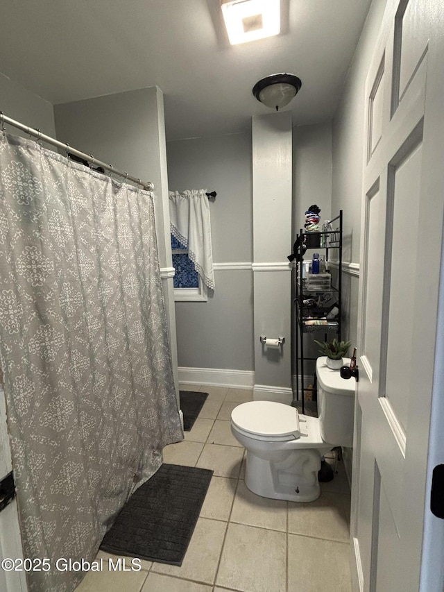 3516 Consaul Rd, Schenectady, NY 12304 - full bath featuring toilet, tile patterned flooring, baseboards, and a shower with curtain