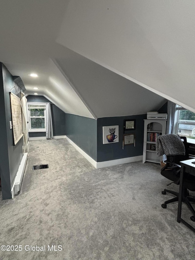 3516 Consaul Rd, Schenectady, NY 12304 - home office featuring vaulted ceiling, carpet floors, healthy amount of natural light, and baseboards