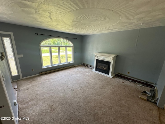 6770 Obrien Rd, Rome, NY 13440 - unfurnished living room featuring baseboard heating, carpet floors, a glass covered fireplace, and baseboards