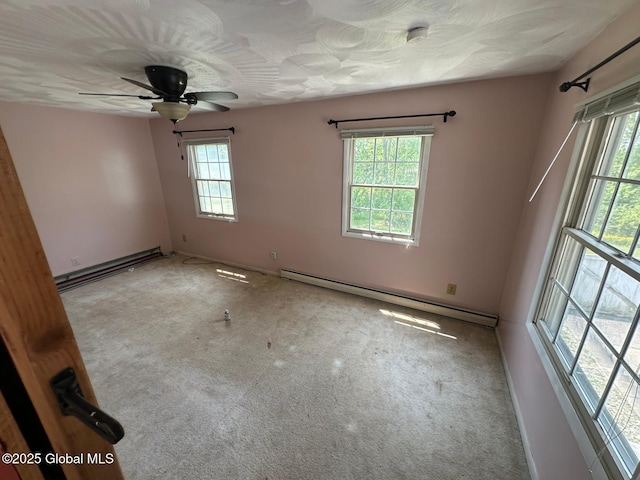 6770 Obrien Rd, Rome, NY 13440 - empty room with baseboard heating, carpet floors, ceiling fan, and a smoke detector