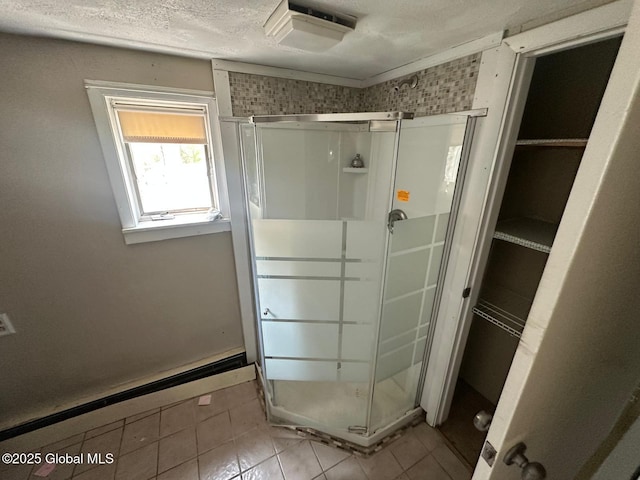 6770 Obrien Rd, Rome, NY 13440 - full bath featuring a stall shower, tile patterned flooring, and a textured ceiling