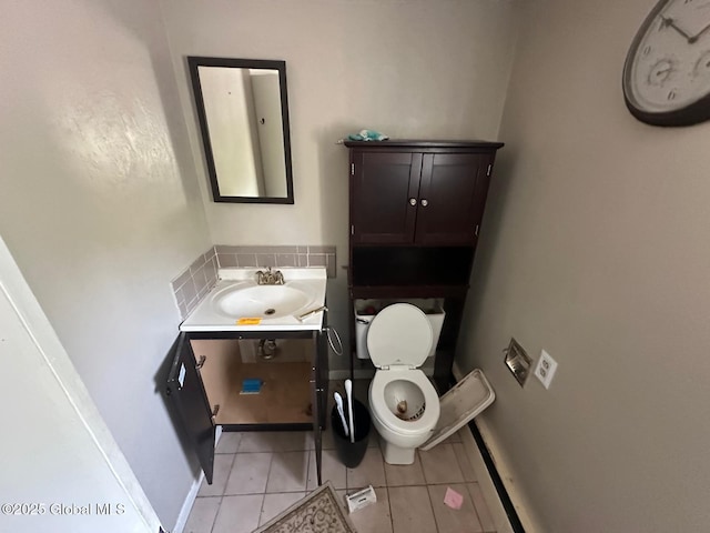 6770 Obrien Rd, Rome, NY 13440 - half bathroom featuring toilet, tile patterned flooring, and vanity