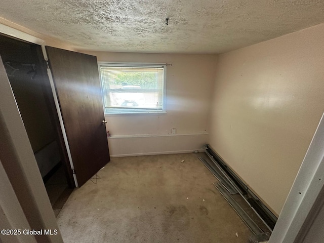 6770 Obrien Rd, Rome, NY 13440 - empty room featuring a textured ceiling and light carpet