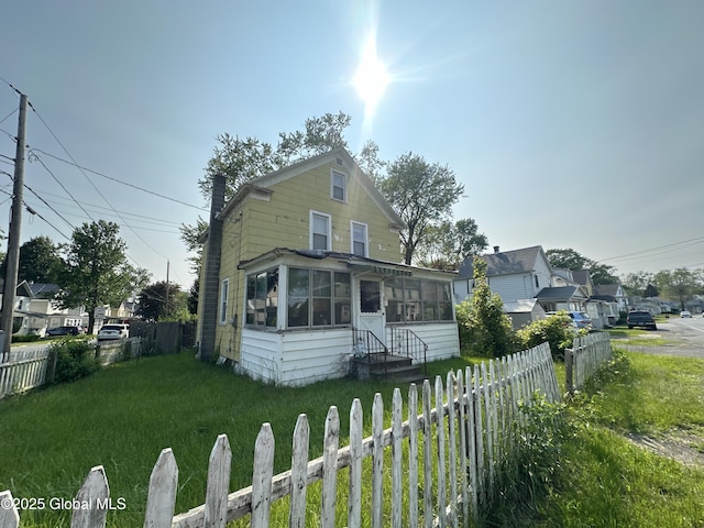 3226 Albany St, Schenectady, NY 12304 - traditional-style house with a sunroom