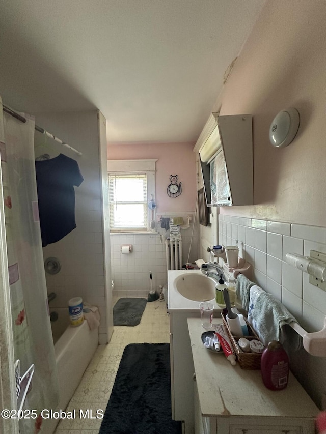 3226 Albany St, Schenectady, NY 12304 - full bathroom with tile walls, vanity, shower / bath combo with shower curtain, and tile patterned floors