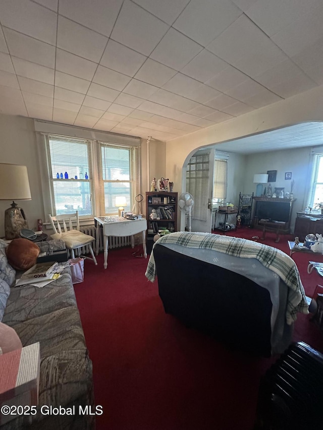 3226 Albany St, Schenectady, NY 12304 - carpeted living room with arched walkways