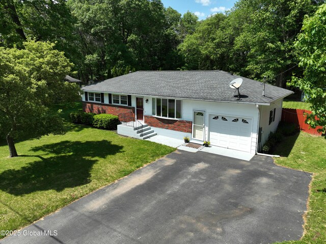 44 St Jude Ln, Glenville, NY 12302 - single story home featuring a garage, driveway, roof with shingles, a view of trees, and brick siding