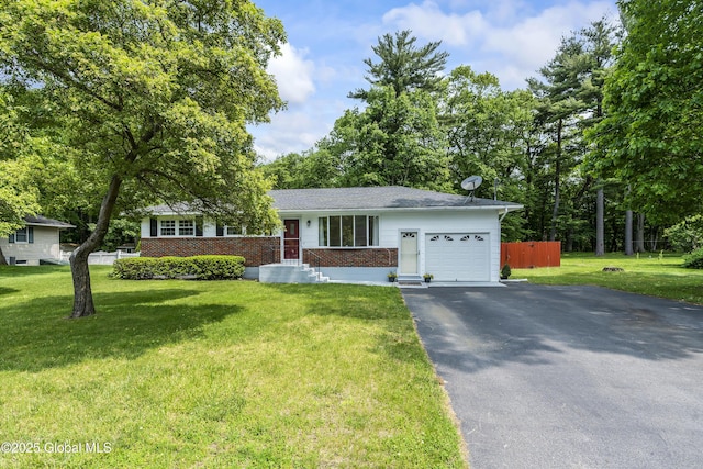 44 St Jude Ln, Glenville, NY 12302 - view of front facade with a garage, brick siding, and driveway
