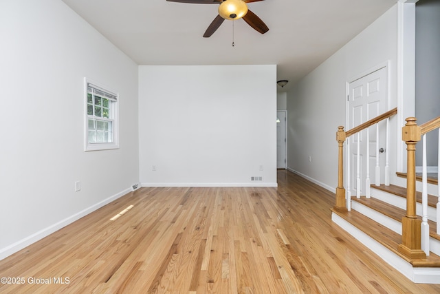44 St Jude Ln, Glenville, NY 12302 - spare room with ceiling fan, light wood-type flooring, stairs, and baseboards