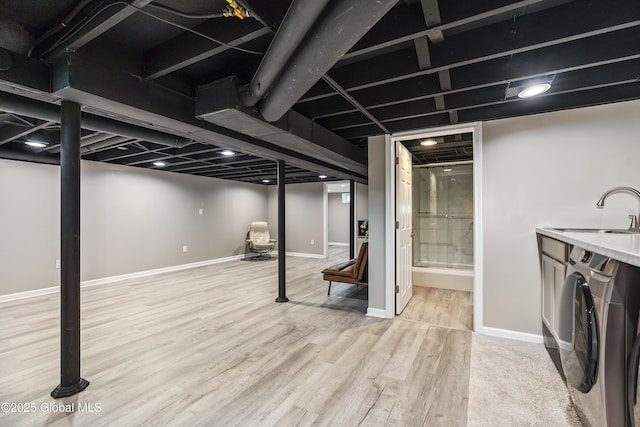 44 St Jude Ln, Glenville, NY 12302 - finished basement with a sink, light wood-type flooring, and baseboards