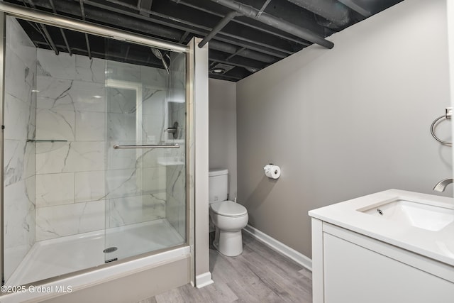 44 St Jude Ln, Glenville, NY 12302 - bathroom featuring toilet, a shower stall, vanity, baseboards, and wood finished floors
