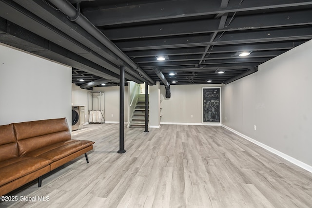 44 St Jude Ln, Glenville, NY 12302 - finished basement featuring washer / dryer, wood finished floors, stairway, and baseboards