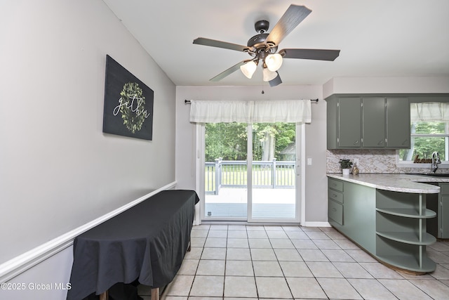 44 St Jude Ln, Glenville, NY 12302 - kitchen featuring open shelves, light tile patterned flooring, a sink, a ceiling fan, and light countertops