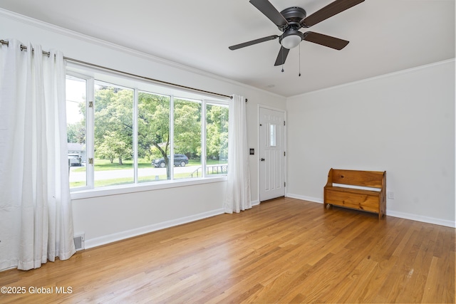 44 St Jude Ln, Glenville, NY 12302 - spare room with baseboards, light wood-style floors, crown molding, and a ceiling fan