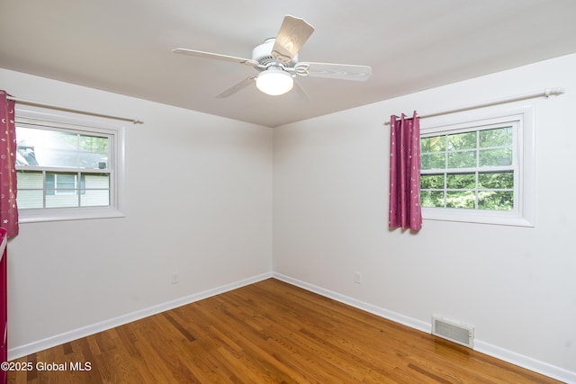 44 St Jude Ln, Glenville, NY 12302 - spare room featuring plenty of natural light, wood finished floors, baseboards, and a ceiling fan