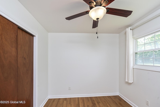44 St Jude Ln, Glenville, NY 12302 - unfurnished bedroom featuring wood finished floors, a closet, baseboards, and ceiling fan