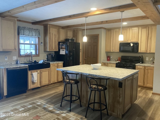 841 Battle Hill Rd, Hague, NY 12836 - kitchen featuring black appliances, beamed ceiling, wood finished floors, light countertops, and a breakfast bar area
