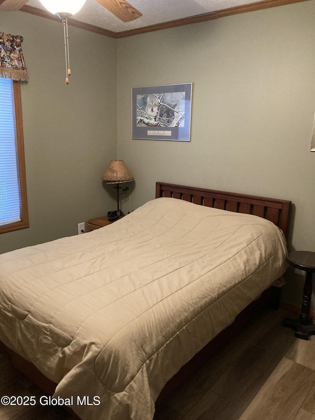 841 Battle Hill Rd, Hague, NY 12836 - bedroom featuring wood finished floors and crown molding