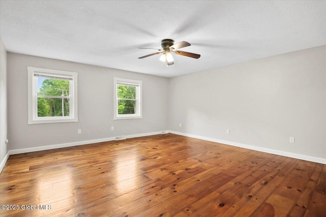 61 Lemaire Way, Argyle, NY 12809 - empty room with ceiling fan, hardwood / wood-style flooring, and a textured ceiling