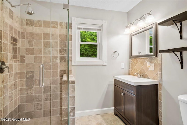 61 Lemaire Way, Argyle, NY 12809 - bathroom with a stall shower, vanity, and backsplash