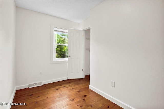 61 Lemaire Way, Argyle, NY 12809 - spare room with wood-type flooring and baseboards